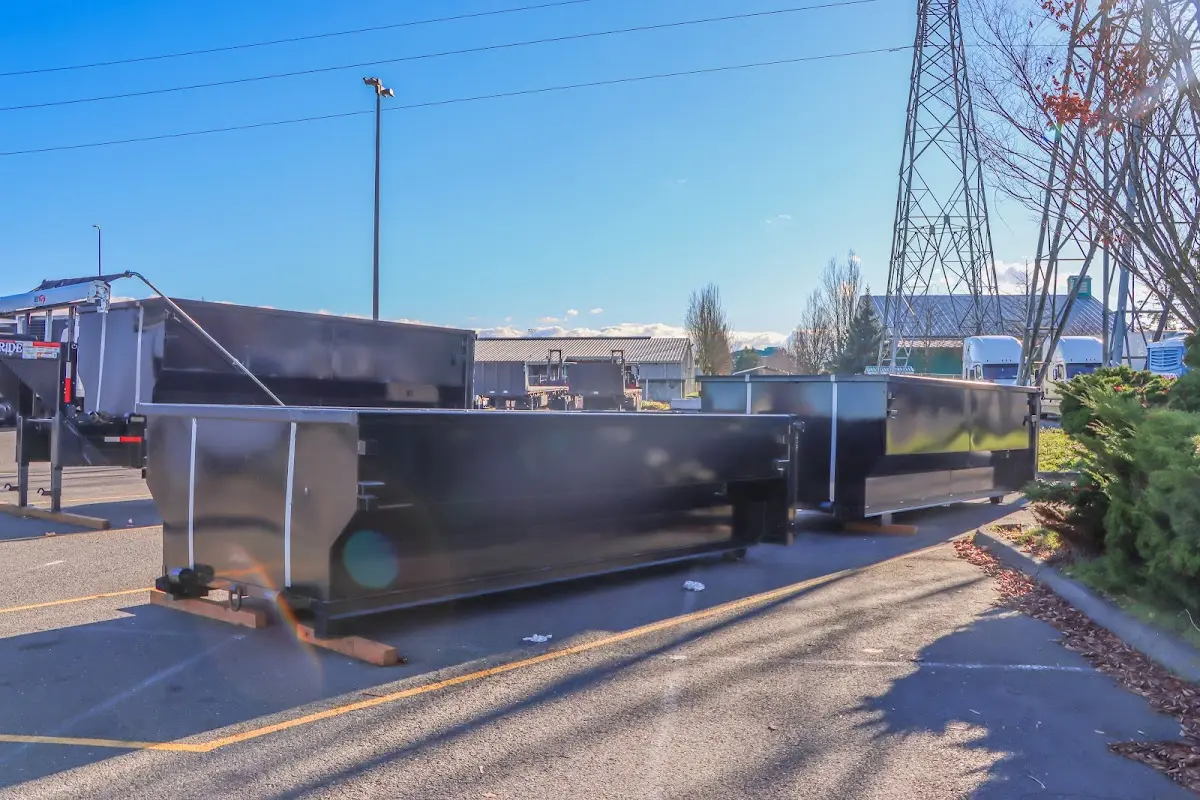 Roll-off dumpster ready for waste disposal at job site for 3 Yard Dumpster Rental in Cranberry